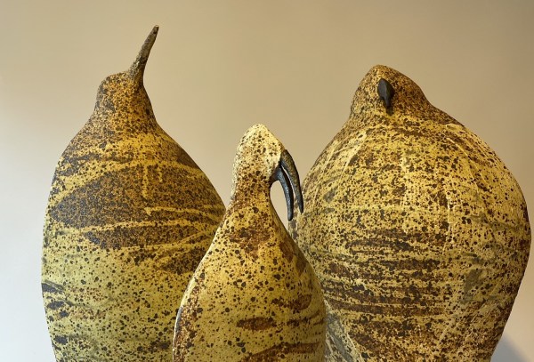 three bird-like sculptures