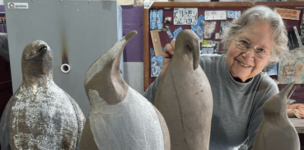 Aimee poses with pots